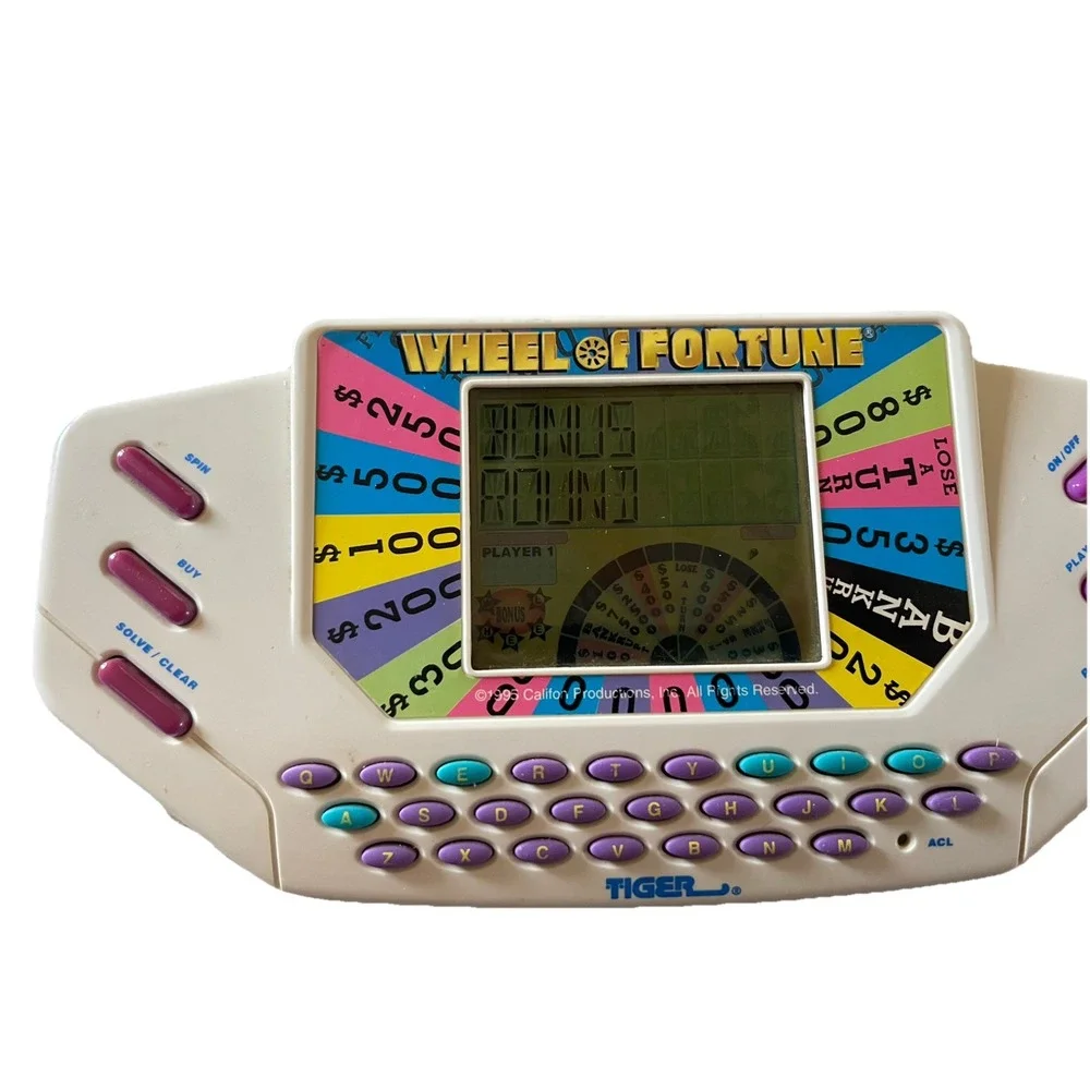 Vintage Tiger Electronics Wheel of Fortune Handheld Game Fun Family Working 1995
